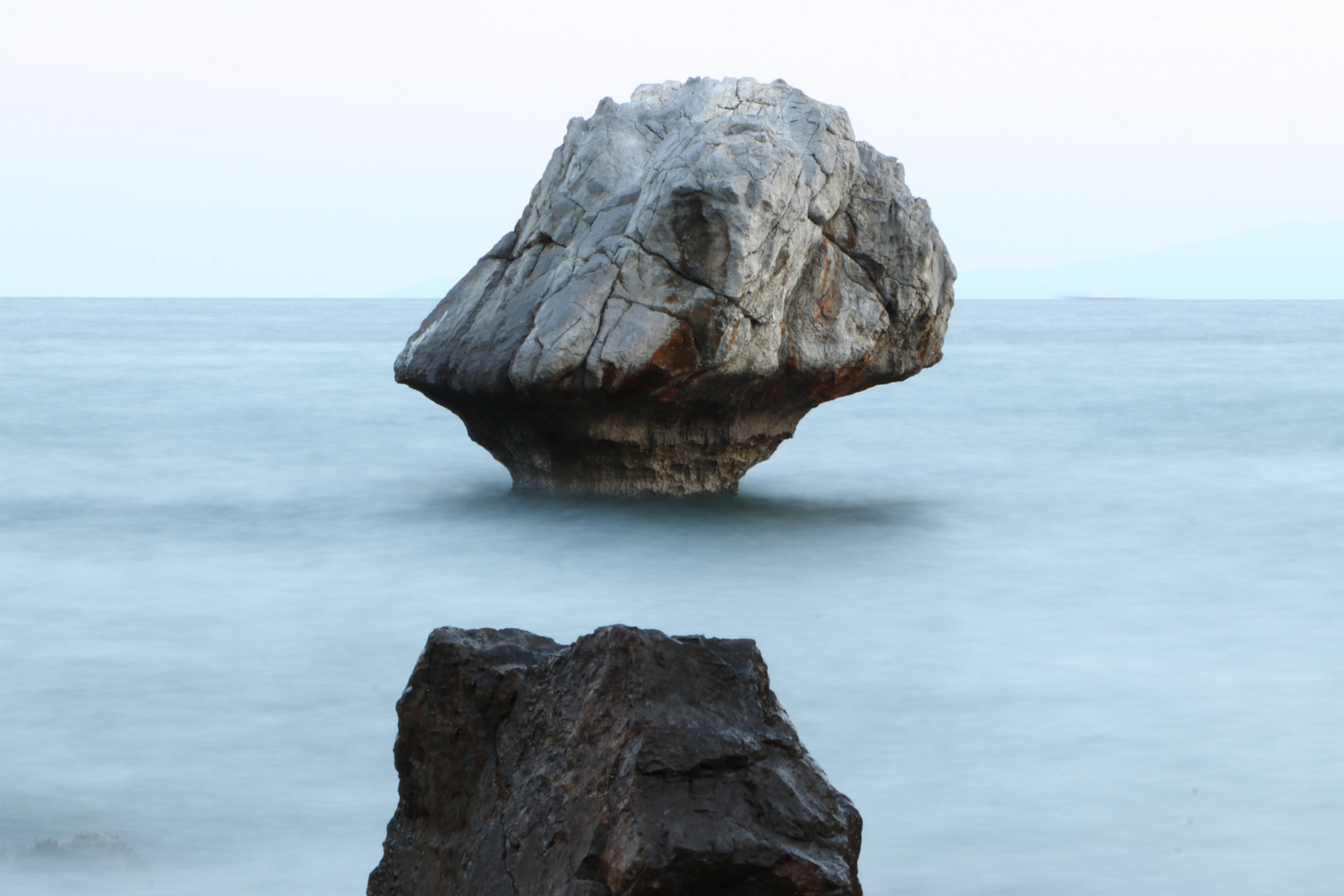 Rock on the sea cloud