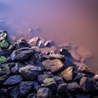 Rocks in moody water