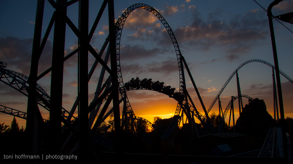 rollercoaster ride at sunset