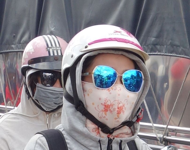 Rollerfahrer in Saigon