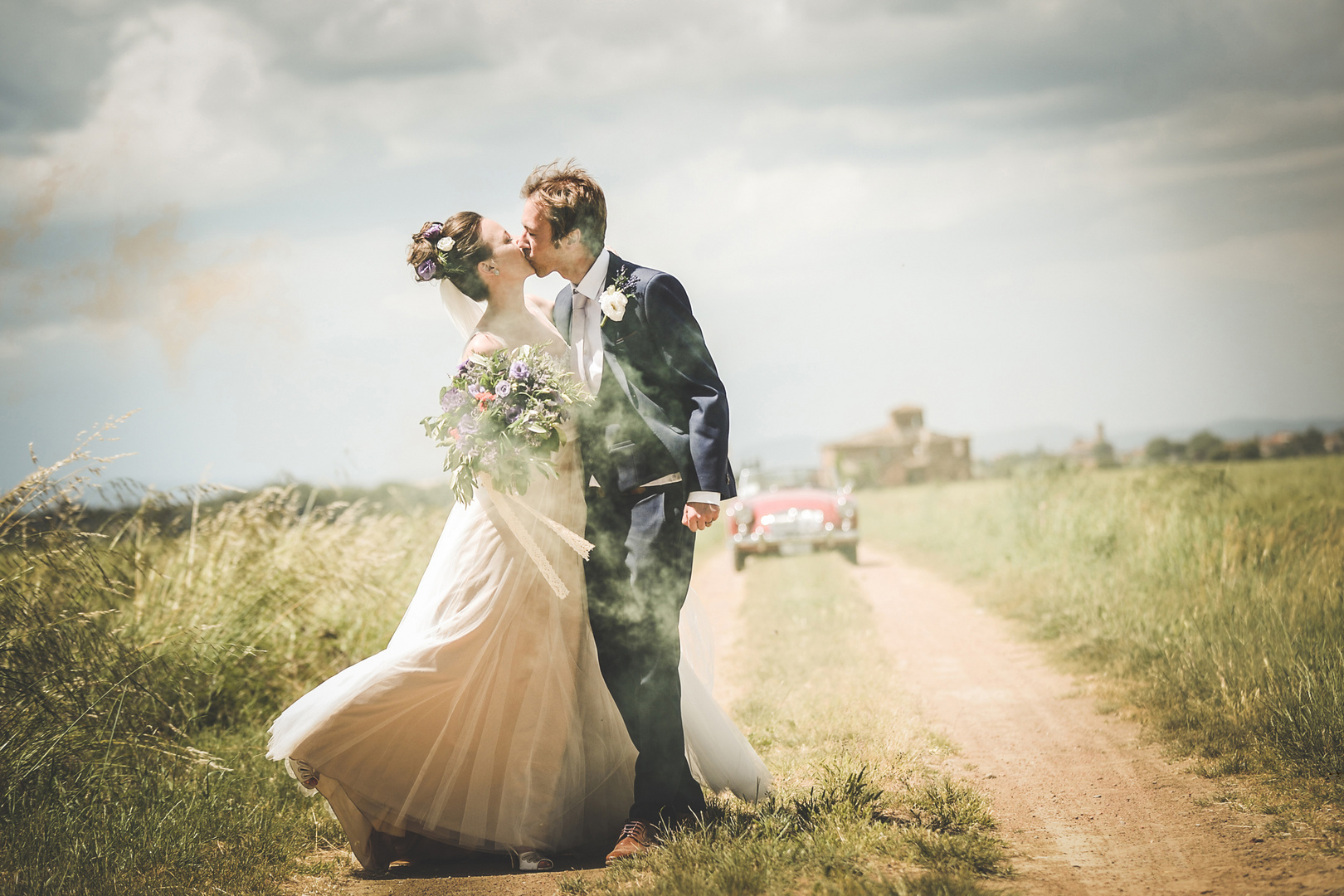 Romantic kiss in Tuscany.