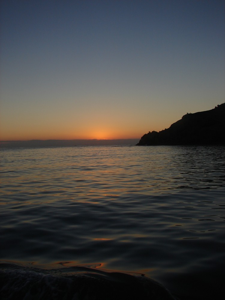 Romantic sunrise on a fisherboat