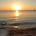 Romantik beim Sonnenuntergang am Strand 