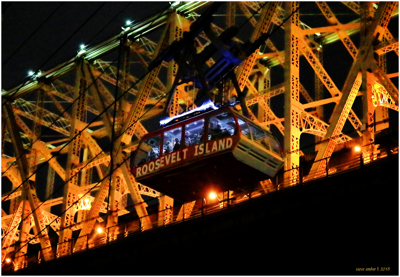 Roosevelt Island Tram alongside Queensboro Bridge