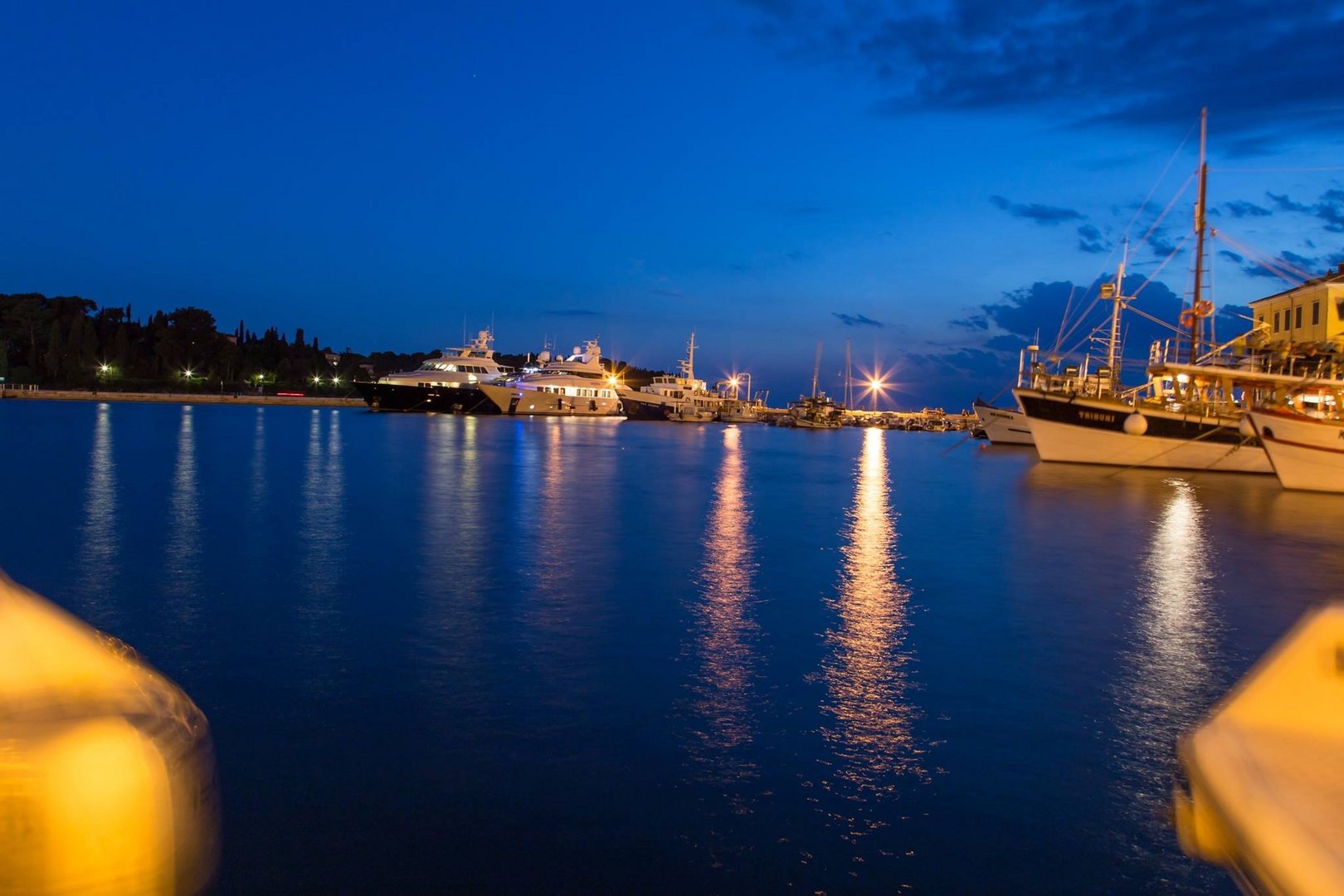 Rovinj harbor by night