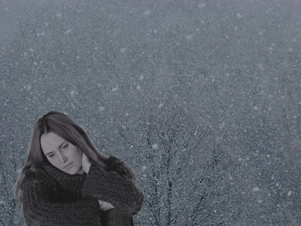 Sad girl in snow...