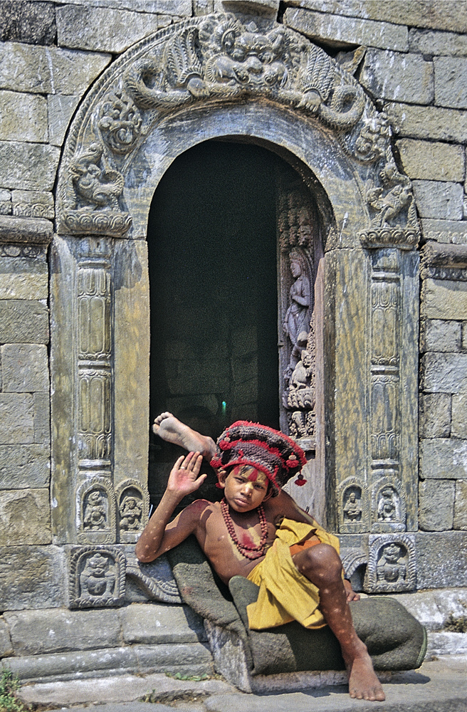 Sadhu boy in Pashuaptinath in front of the Shiva temple