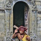 Sadhu boy in Pashuaptinath in front of the Shiva temple