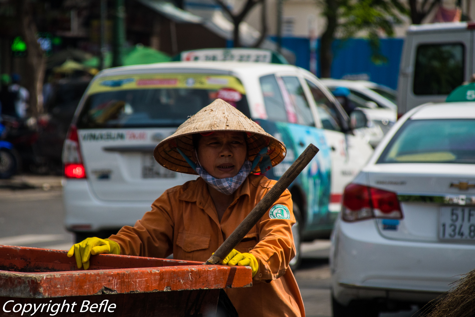 Saigon,  Frau der Strassenreinigung