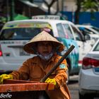 Saigon,  Frau der Strassenreinigung