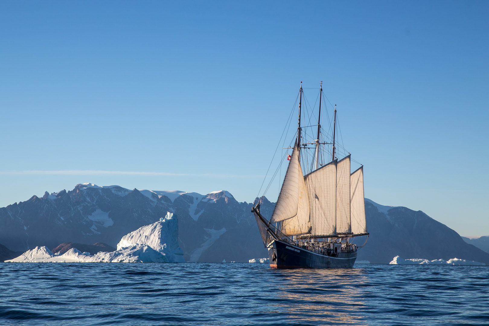 Sailing Boat and icebergs