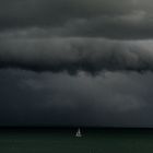 Sailing Boat And Upcoming Storm