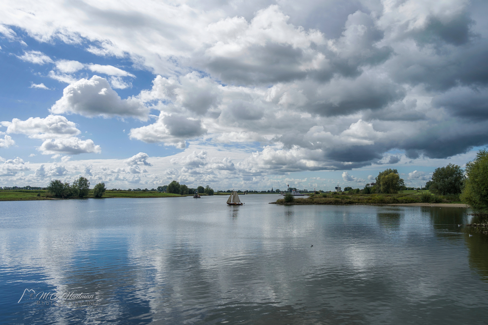 Sailing over the water in the old barge