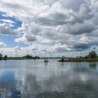 Sailing over the water in the old barge