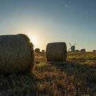 Sails and Bales at Sunset.