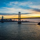 San Francisco Bay Bridge at sunset. 