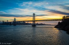 San Francisco Bay Bridge at sunset. 