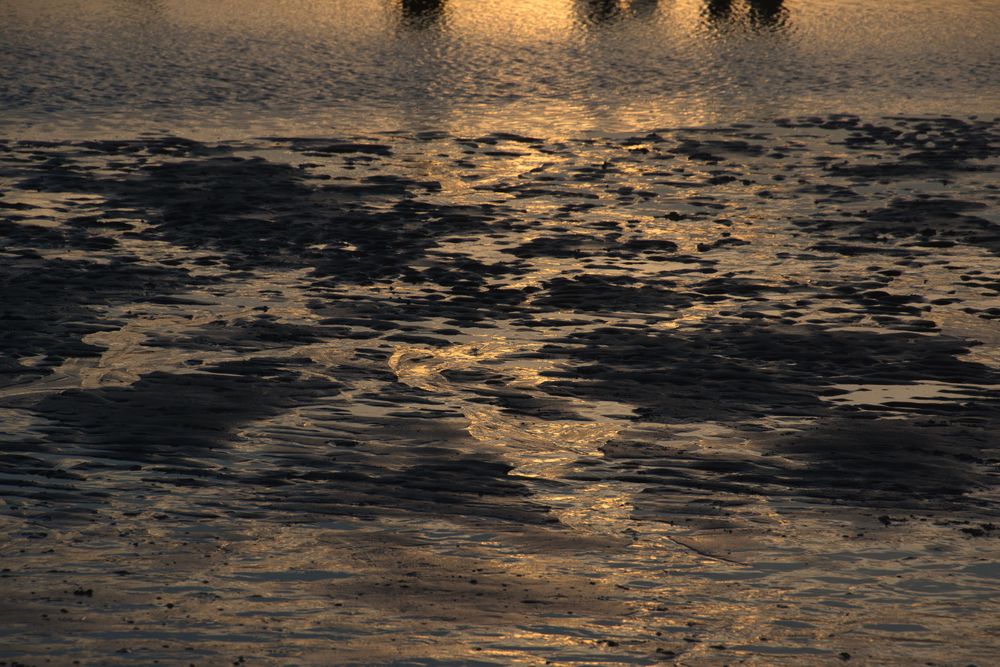 Sand absorbiert letztes Licht