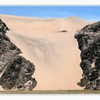 sand dune eats rocks ......