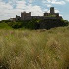 Sand dunes and Bamburgh Castle