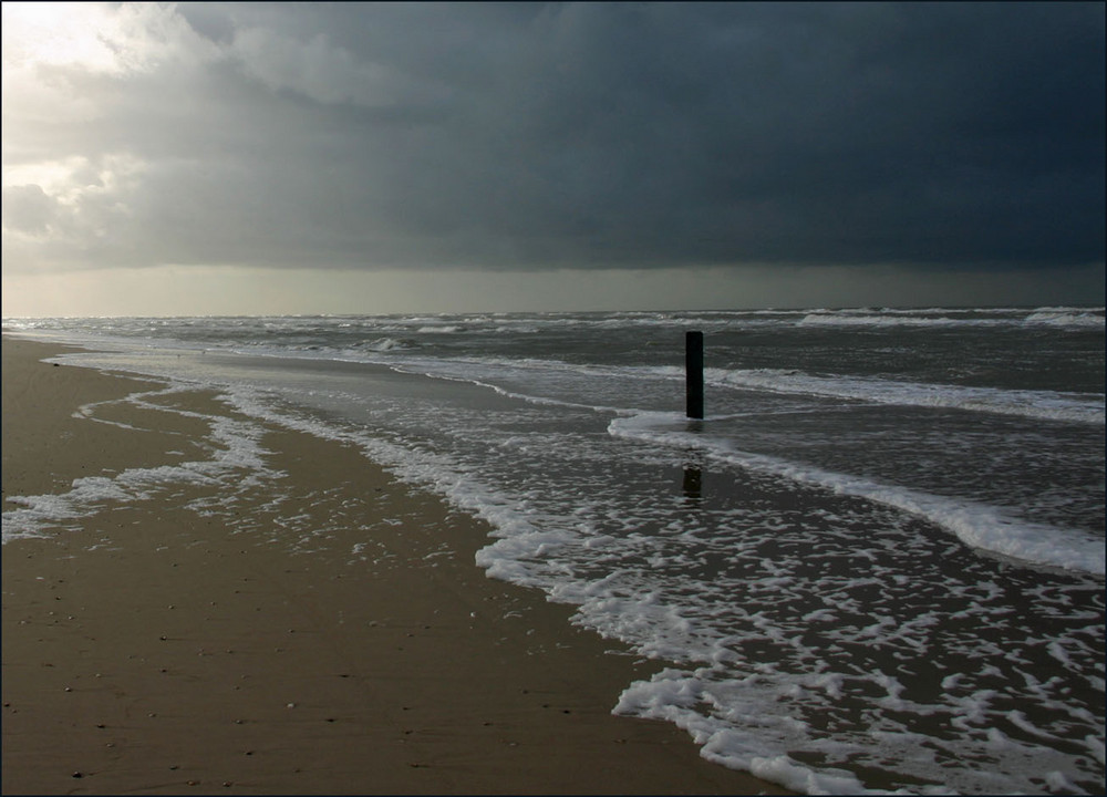 Sand, See und Wolken