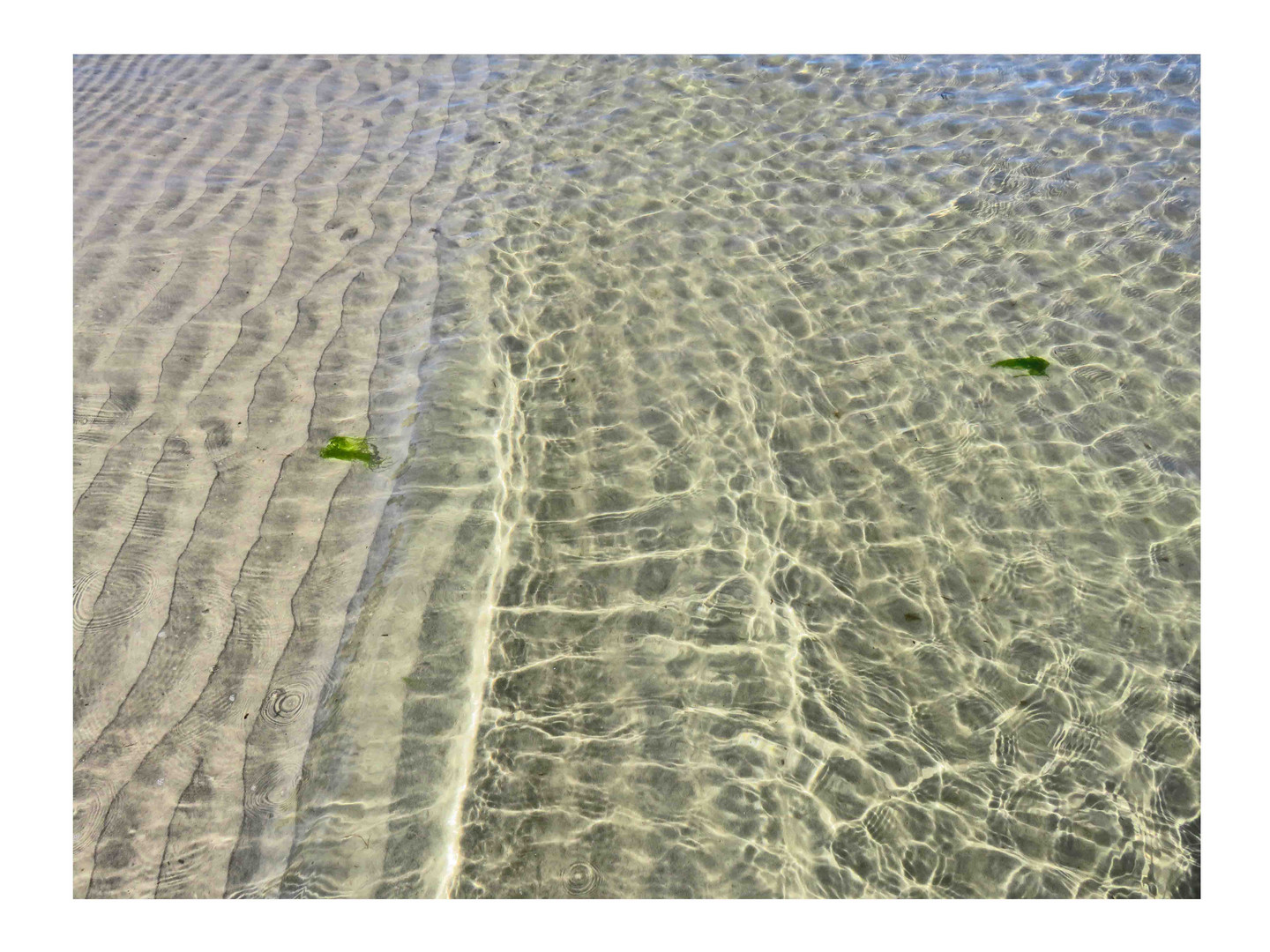 Sand und Wasser