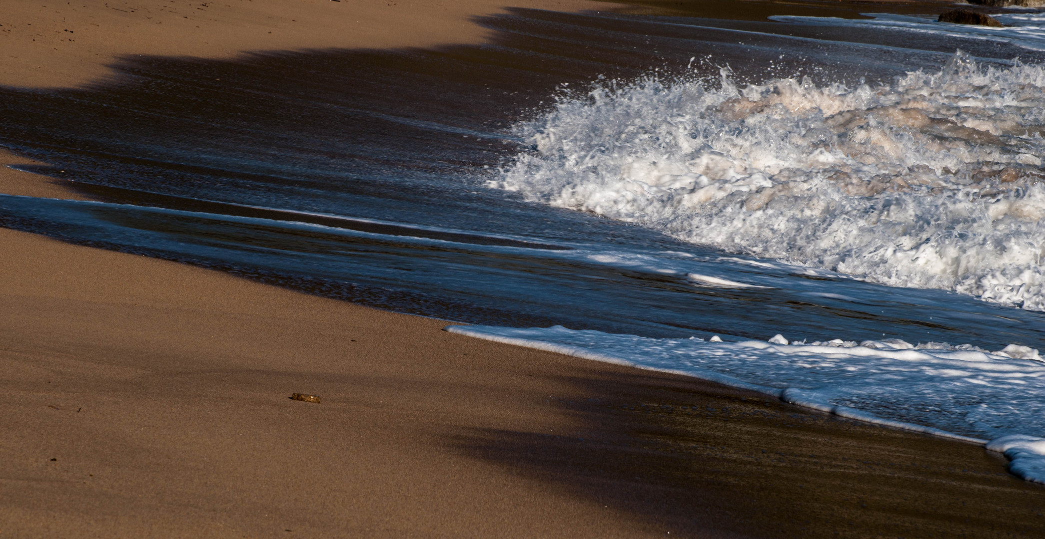 Sand und Wasser