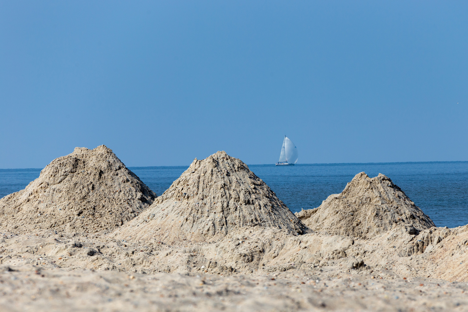 Sandarbeit am Strand