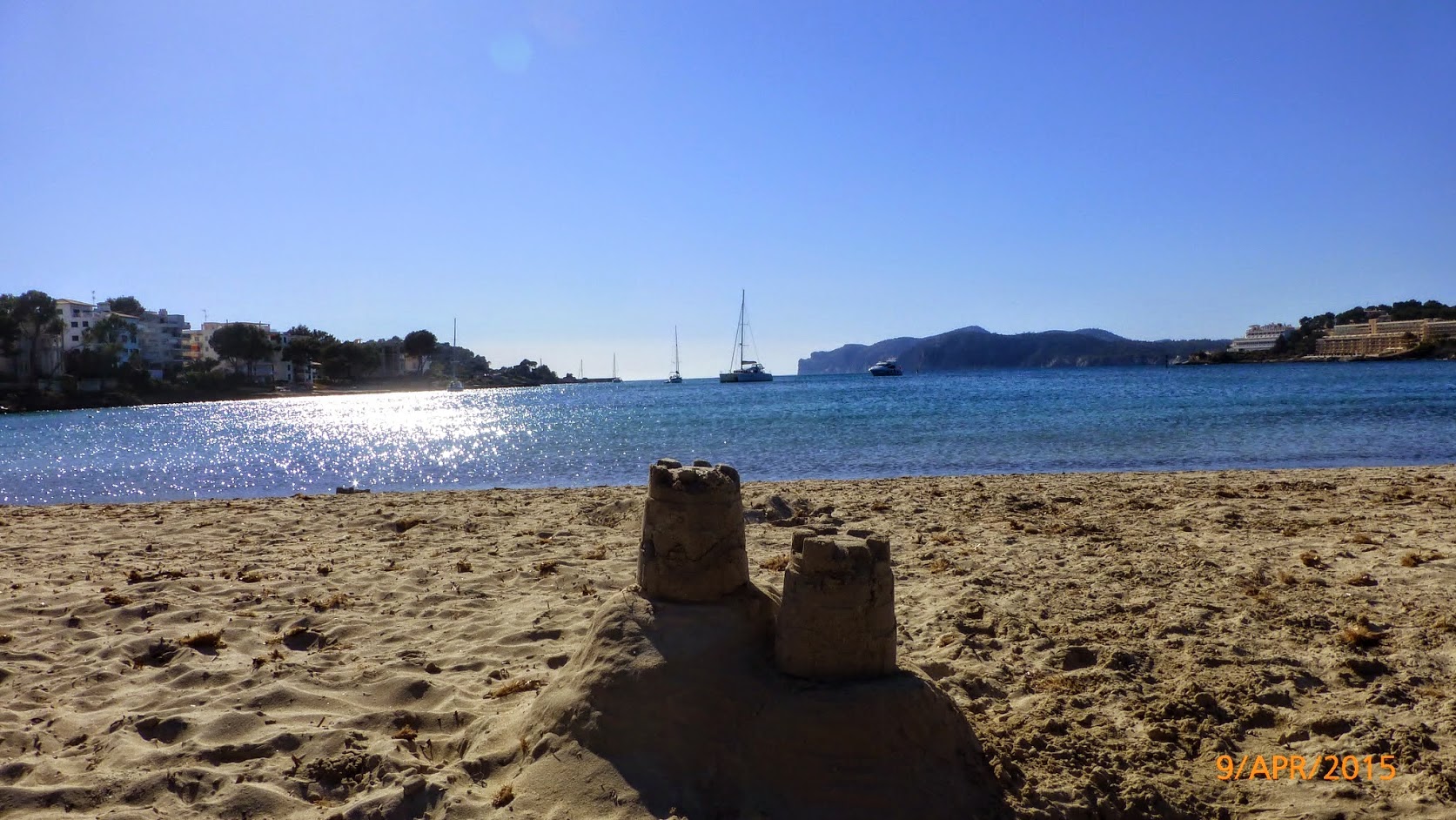 Sandcastles on a deserted beach