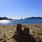 Sandcastles on a deserted beach