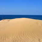 Sanddüne mit blauem Himmel