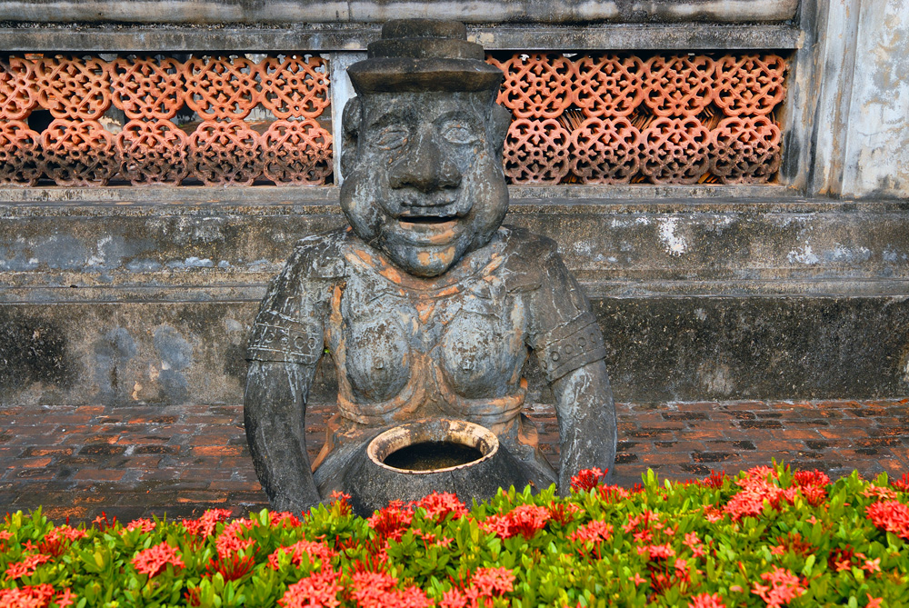 Sandstone figure as a temple guard