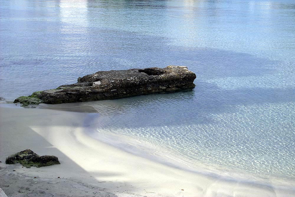 Sandstrand und Schatten