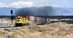 Santa Fe #6376 ATSF is leading a Double Stack Container and All purpose Cars withTrailer, Delies,NM