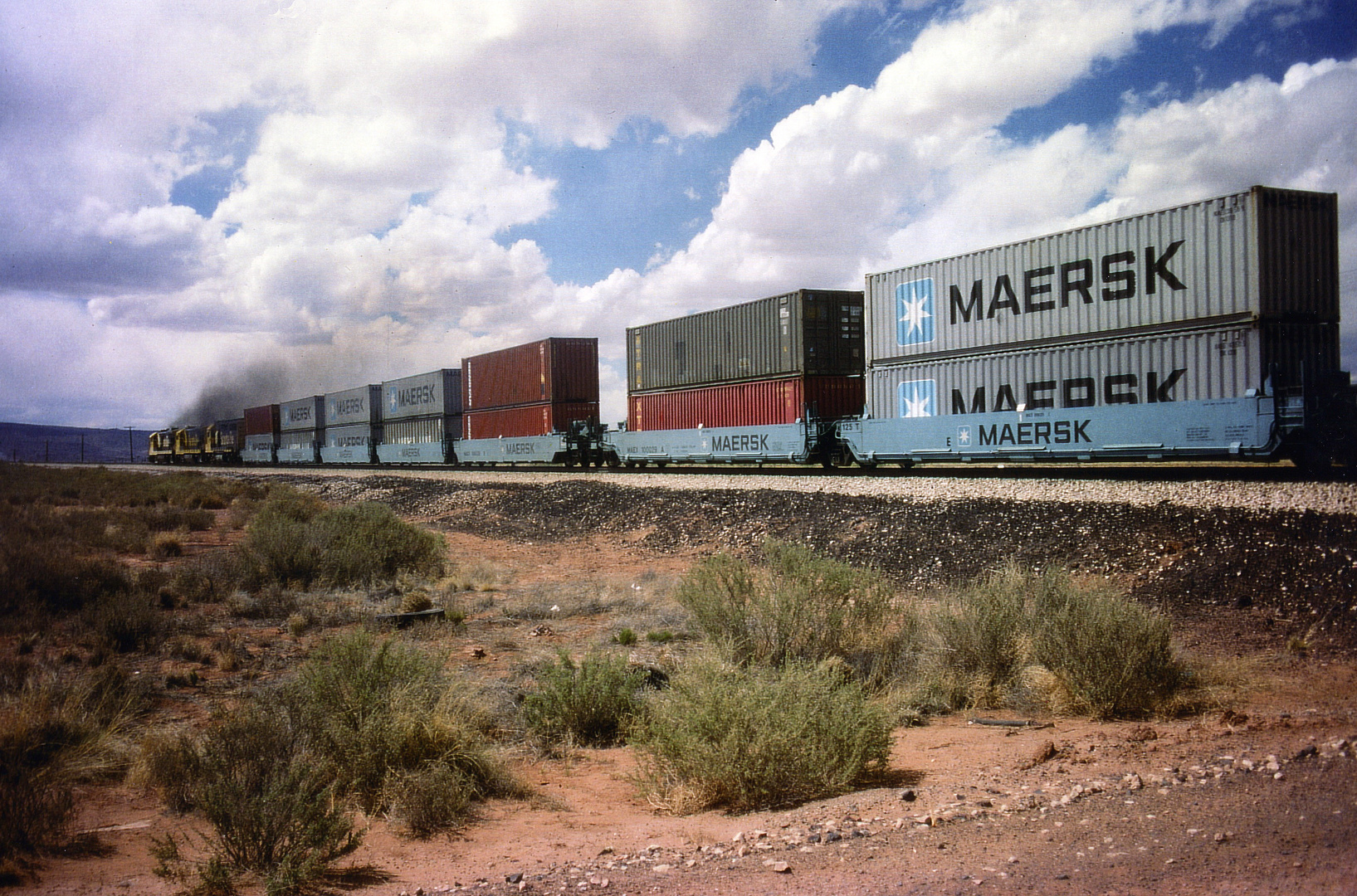 Santa Fe #6376 is leading a Double Stack Container and All purpose Cars withTrailer, Delies,NM