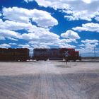 Santa Fe wb EMD GP60M #134, Santa Fe ywb EMD GP40-2 #3839 at high noon near Dalies, NM