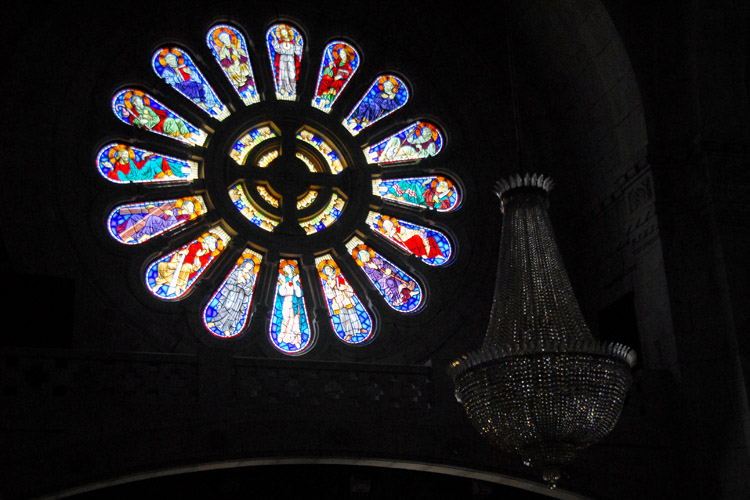 Santa Luzia Church - stained-glass window and the chandliar