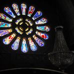 Santa Luzia Church - stained-glass window and the chandliar