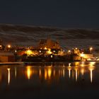 Scalloway castle and harbour at night