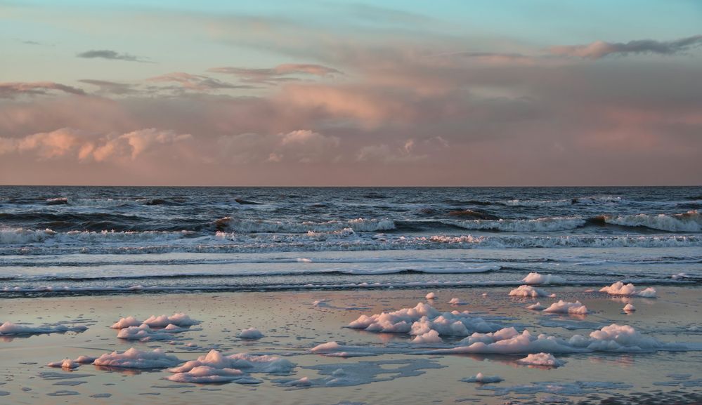 Schaumkronen in Rose' getaucht