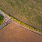 Scheideweg, der Lichtspot auf dem Feld ist von der untergehenden Sonne