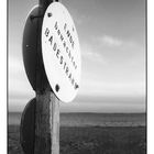 Schild am Meer