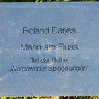 schild mann am fluss