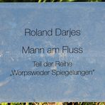 schild mann am fluss