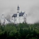 Schloss Neuschwanstein in den Wolken