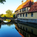 Schlossbrücke und Torhaus des Schlosses Burgsteinfurt im Abendlicht