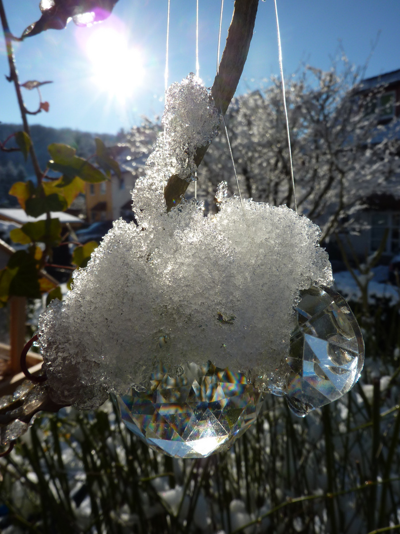 Schnee Kristall am seidenen Faden.