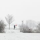 Schneemann mit roter Mütze