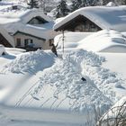 Schneeschieben auf dem Dach