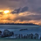 Schneewolken verhüllen die Sonne